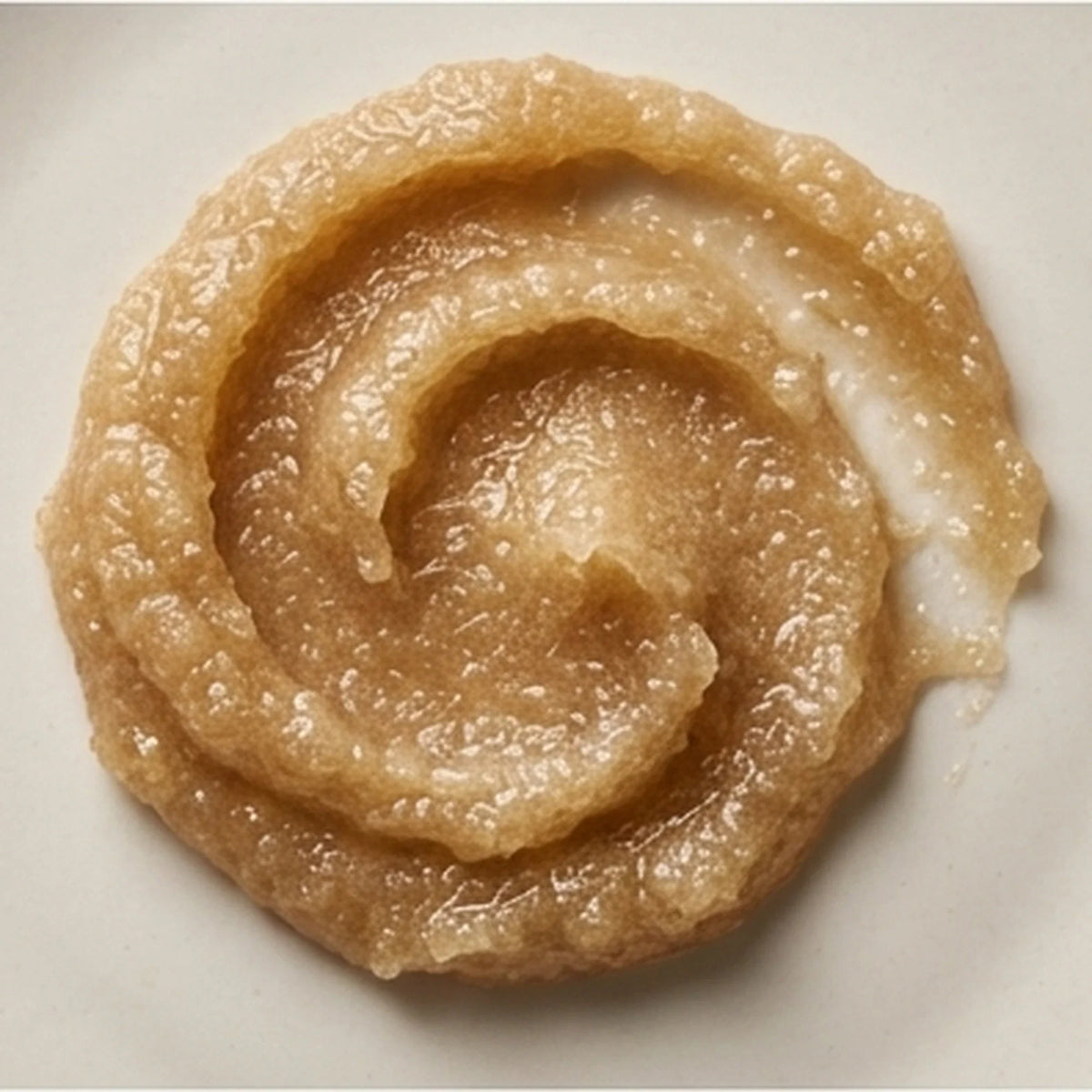 Skindae Glow Melt Polish – brightening sugar body polish, amber scrub texture – circular swirl swatch